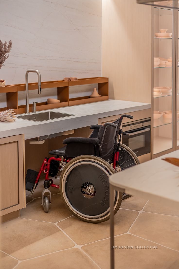 Accessible SDA kitchen with step-free circulation and wheelchair-accessible benchtop